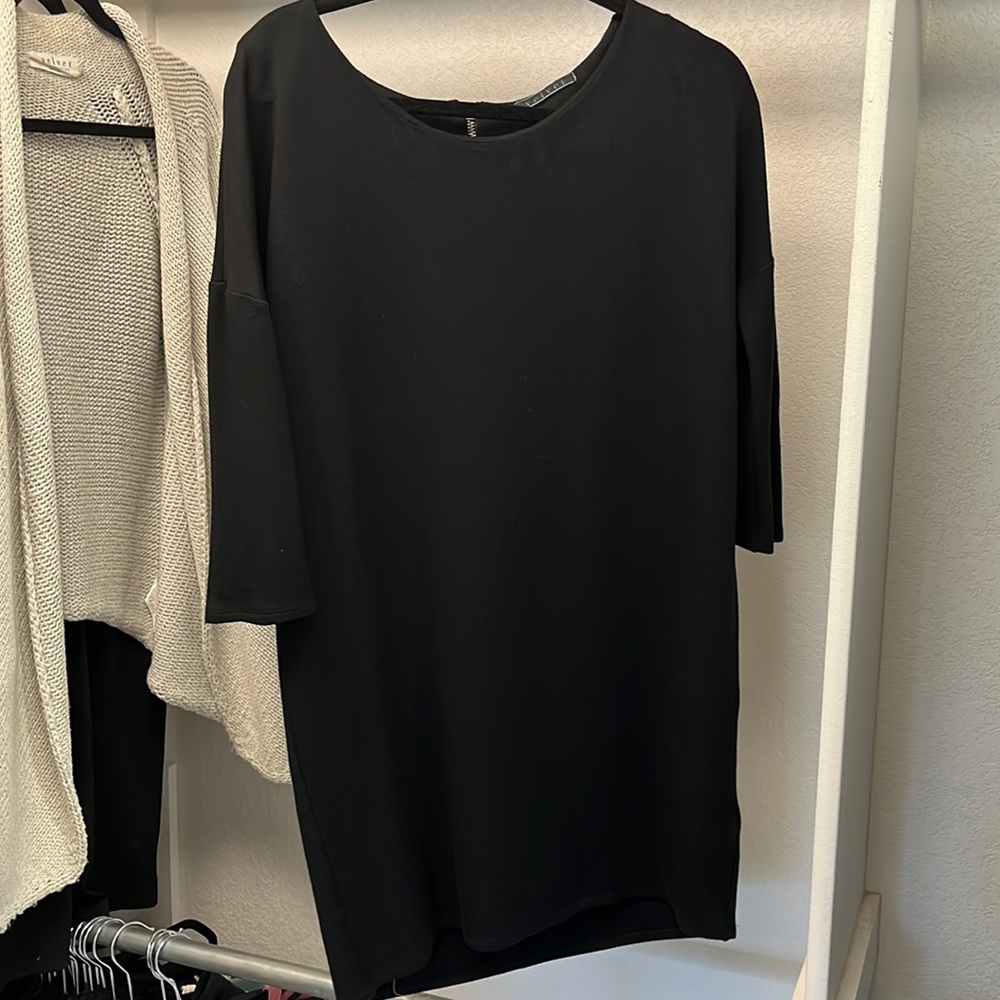 Black Velvet dress.  Easy and flattering. Mini dress with 3/4 length sleeves